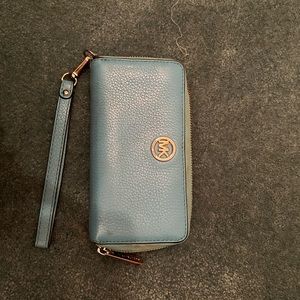 USED Michael Kors blue/ teal colored wallet with wristlet